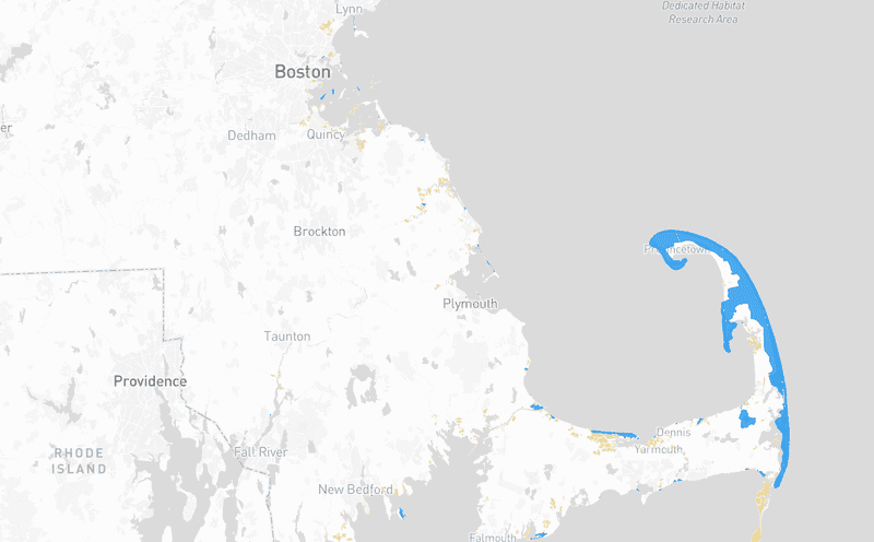 A map of Massachusetts showing beaches shaded blue and other public coastal access points in yellow.